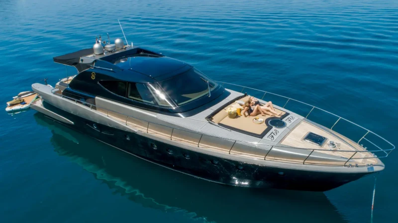 Woman sunbathing on Fashion 68 Cantiere Navale deck
