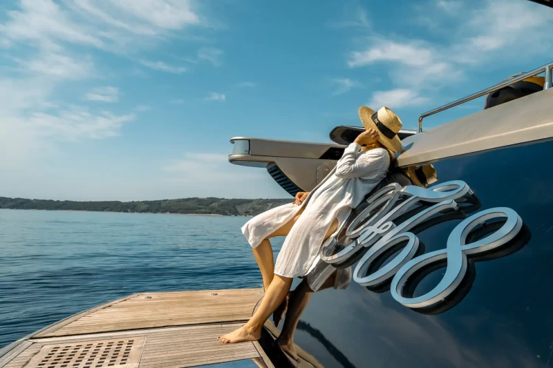 Woman enjoying sun on Fashion 68 Cantiere Navale