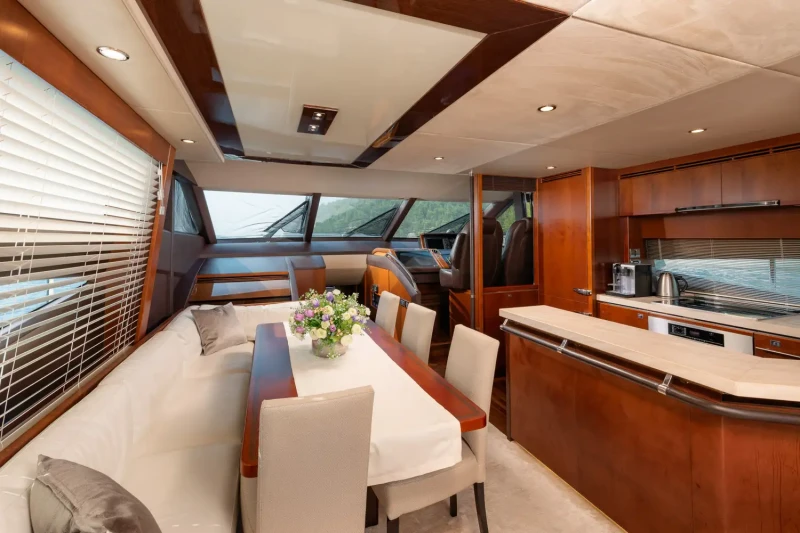 Indoor dining table on yacht Princess 72