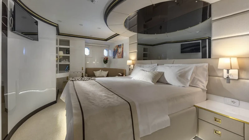 Custom Line 143 Aurum Sky yacht bedroom, king size bed and tv