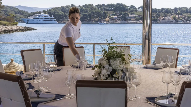 Custom Line 143 Aurum Sky yacht dining table set up