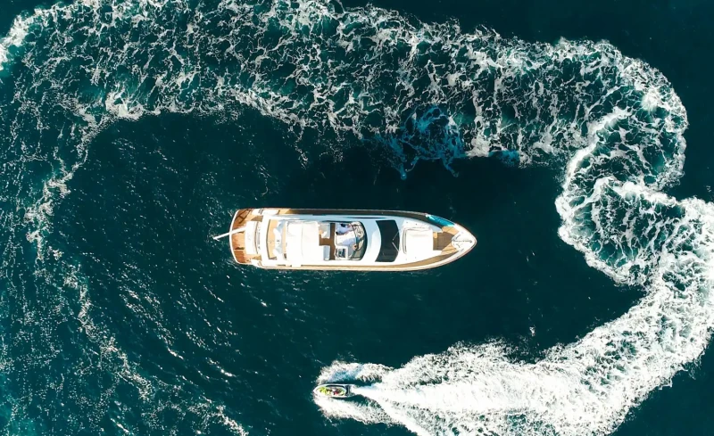 Filippetti Yacht Lukas anchored in the adriatic, jet ski driving around it
