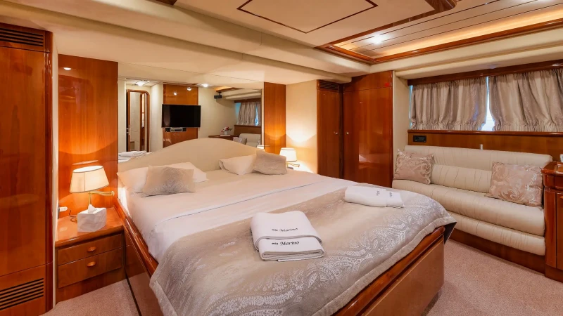 Ferretti Yacht 730 Marino, king size bed in the bedroom, with lights on