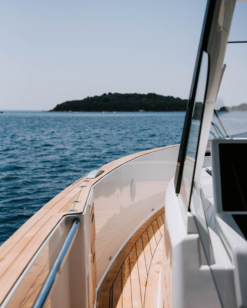 Fjord 53 XL yacht’s teak side deck with breathtaking Adriatic views.