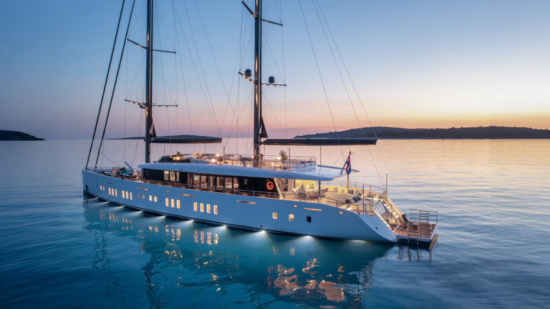 Majestic sailing yacht anchored at sunset near the Croatian coastline