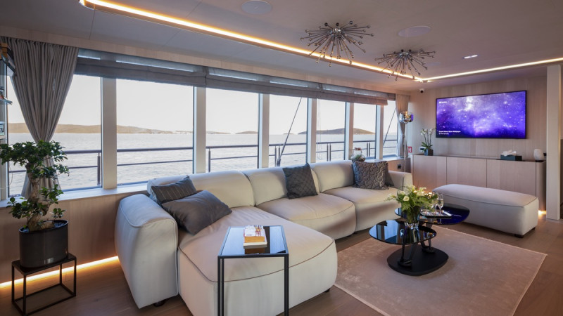 Spacious yacht lounge area elegantly furnished