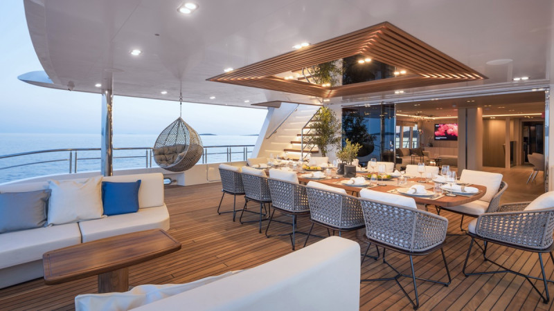 Spacious yacht lounge area elegantly furnished